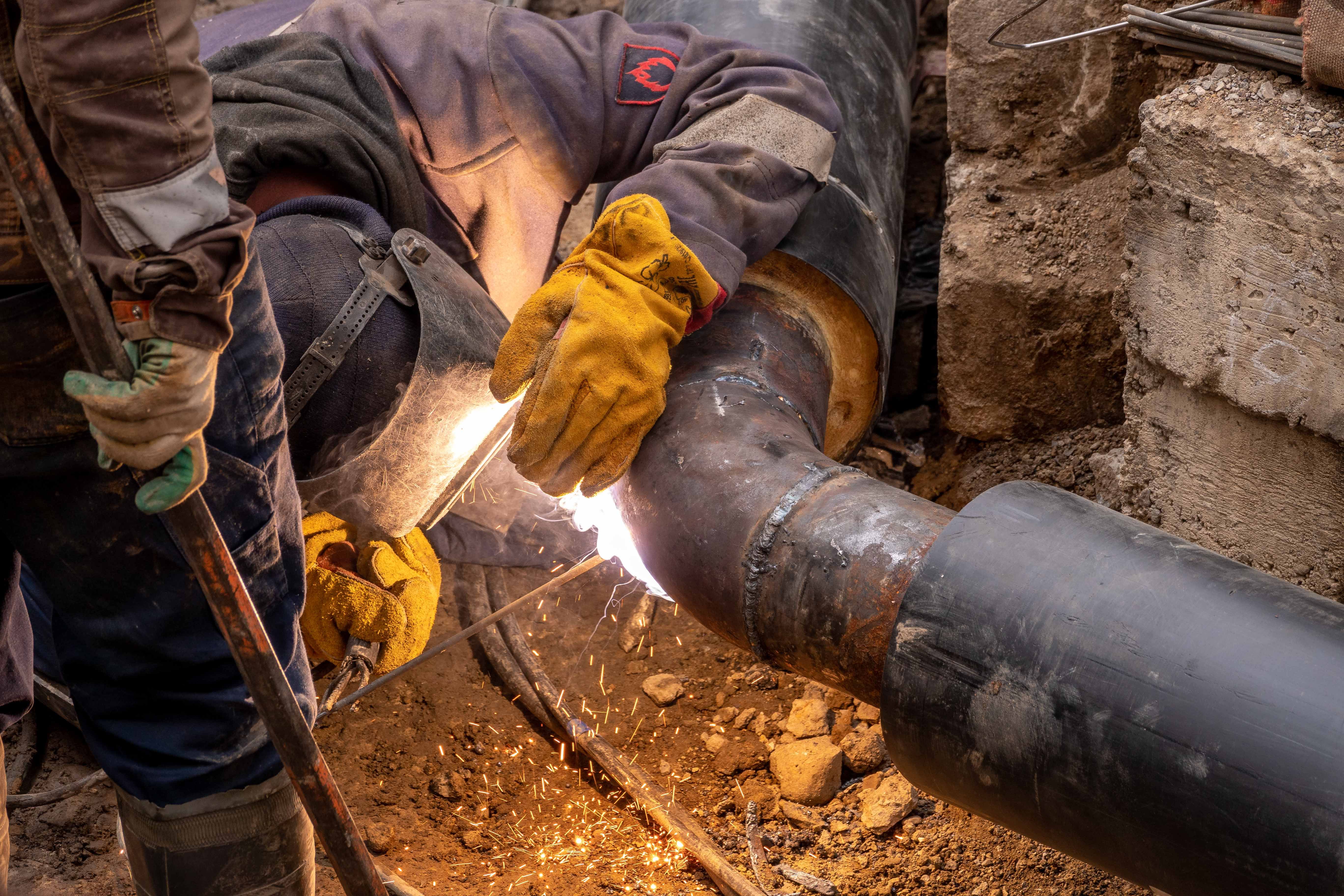 Professional plumber at work